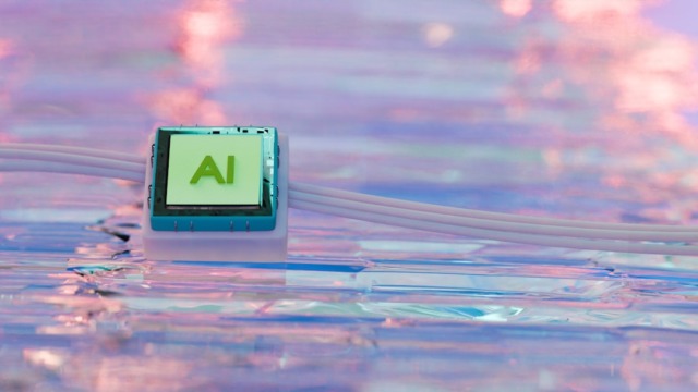 Futuristic artificial intelligence microchip resting on vibrant, glossy surface with pastel reflections and surreal lighting, representing technology innovation and digital transformation | A square of aluminum is resting on glass.