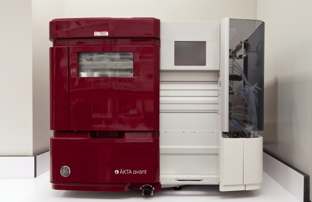 Chromatography Machine at Mass Spectrometer at Advanced Technology Research Facility (ATRF), Frederick National Laboratory for Cancer Research, National Cancer Institute. | red and white fire extinguisher